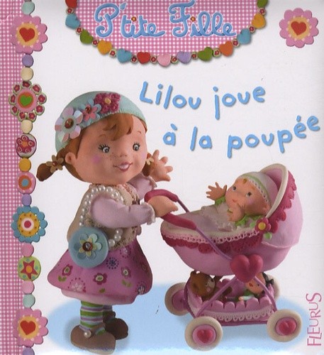 Lilou joue à la poupée - Click to enlarge picture.